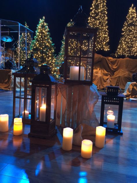 Lanterns-1 Christmas Worship Stage Ideas, Candle Light Stage Design, Christmas Platform Ideas, Modern Church Christmas Decor, Sanctuary Decor Church Stage Design, Church Christmas Decorations Lobby, Christmas Stage Decor, Christmas Church Decorations Sanctuary, Christmas Church Stage Design