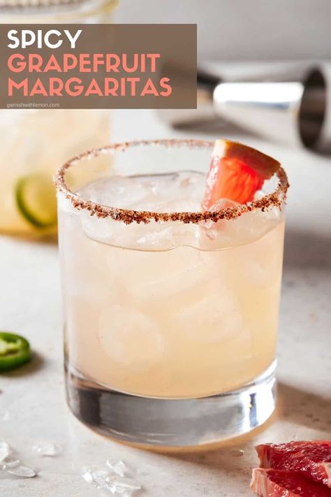 This Grapefruit Margarita is the best of everthing: spicy, sweet and salty. Made with freshly squeezed juices (no bottled mixes here), you'll taste the difference real ingredients make in this spicy margarita recipe. Spicy Cocktails, Grapefruit Cocktail Recipes, Tonic Cocktails, Spicy Margarita Recipe, Grapefruit Margarita, Batch Cocktail Recipe, Grapefruit Cocktail, Spicy Margarita, Tasty Drinks