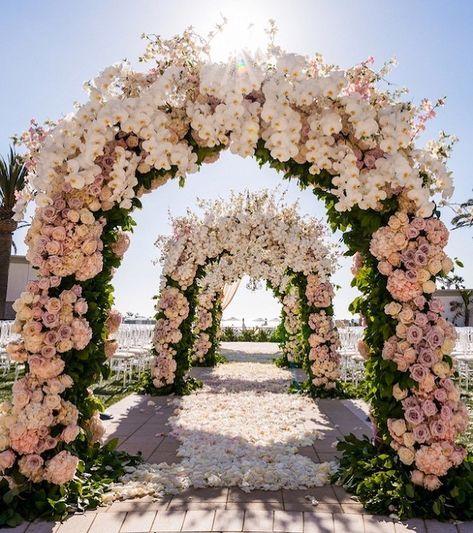 Fresh blooms and this entry walkway decked up with beautiful floral arches !! #decoration #weddingdecoration #indianwedding #floral #entrance #modern #2018 Archway Decor, Wedding Walkway, Wedding Photo Checklist, Fun Wedding Decor, Wedding Entrance Decor, Spring Wedding Decorations, Luxury Wedding Decor, Mandap Decor, Elegant Wedding Reception