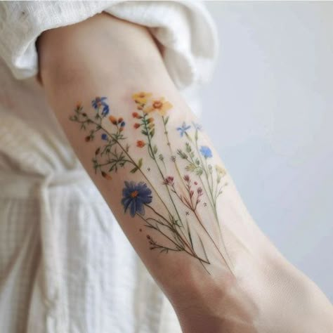 Floral Thigh Tattoos Color, Wildflower Tattoo Thigh, Meadow Flowers Tattoo, Wild Flowers Tattoo, Flower Foot Tattoo, Wildflower Tattoo, Thigh Tattoos Women, Foot Tattoo, Dog Tattoo