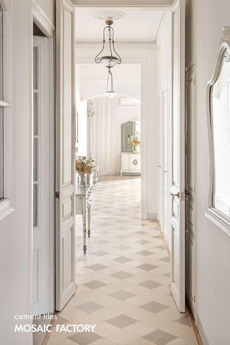 This checkerboard design makes this hallway featuring our monocolour encaustic tiles the most inviting space to explore the rest of this stunning project by (IG)pelusastudio. Elegant and timeless, full of warm character, the cement tiles here are our UNI model size 20x20 cm in colours LC and LM. All our cement tile designs can be customised in bespoke colours directly online. Visit our website and find this design in stock! Hall Floor Tile Design, Cement Tiles Kitchen, Tiled Hallway Floor, Terrazzo Tile Floor, Hallway Tiles Floor, Concrete Tile Floor, Hall Flooring, Tiled Hallway, Hallway Flooring