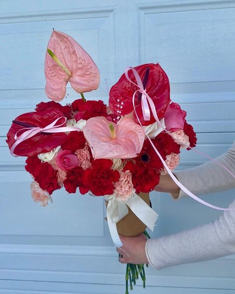 a cutie valentines bouquet i made for a client 🎀 #flowers #florist #miamiflorist #miami #flowerbouquet #flowerbouquets #bouquet #flowerarrangements #flowerarrangement #anthuriums #anthurium #roses #valentinesdayflowers #valentinedayflowers #valentinesdaybouquet #valentinesday #redbouquet #pinkbouquet #bows #couqette #bowsonflowers #bowbouquet Orchid And Anthurium Bouquet, Purple Anthurium, Red Anthurium Bouquet, Pink Anthurium Arrangement, Anthurium Collection, Anthurium Bouquet, Valentines Bouquet, Bow Bouquet, Pink Spray Roses