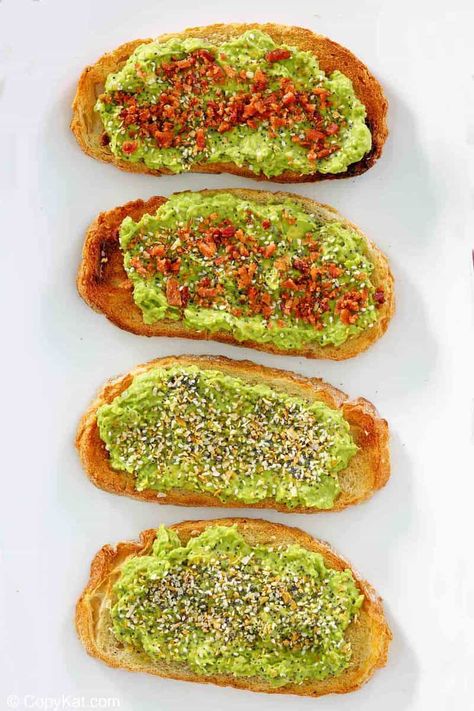 Dunkin Donuts Avocado Toast is delicious toasted bread topped with flavorful mashed avocado and bagel seasoning. Get the easy copycat recipe and find out how to make the best avocado toast topped with homemade seasoning mix, and bacon. Perfect for a healthy breakfast or snack. #avocadorecipe #easybreakfastrecipes #breakfastrecipe #copycat #copycatrecipe Dunkin Avocado Toast, Avocado Toast Dunkin, Dunkin Avocado Toast Recipe, Dunkin Donuts Avocado Toast Recipe, Ripe Avocado Recipes, Avocado Toast Aesthetic, Dunkin' Donuts, Brunch Casseroles, Best Avocado Toast Recipe