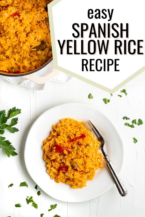 A white plate with arroz amarillo with a fork with it and a dutch oven of the arroz amarillo on the side with the words "easy spanish yellow rice recipe" in the foreground Yellow Rice With Peppers And Onions, Spanish Yellow Rice Recipe Puerto Rico, Diy Yellow Rice, Yellow Spanish Rice Recipe, Arroz Congri Cuban Rice, Goya Yellow Rice Recipe, Cuban Yellow Rice Recipe, Yellow Rice Recipe Spanish, Yellow Mexican Rice