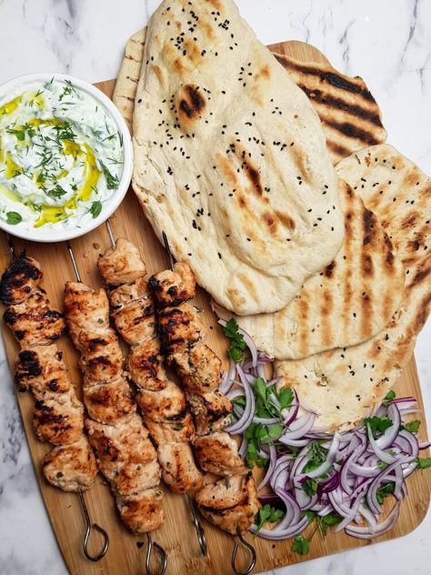 As the weather is getting milder, I decided to dust off my BBQ and cook up some kebabs! I absolutely love this recipe for chicken shish kebabs and make it a couple of times a month. It's relatively healthy, especially if you add lots of salad and low fat yoghurt, but it also packs a serious punch in the flavour stakes so feels like a treat, even though it is healthy.I've included the cooking instructions here for a domestic grill and a griddle pan to cook the chicken and flatbreads as… Shish Kebabs, Homemade Flatbread, Apple Cinnamon Oatmeal, Shish Kebab, Griddle Recipes, Recipe For Chicken, Chicken And Wild Rice, Cinnamon Oatmeal, Vegan Black Bean