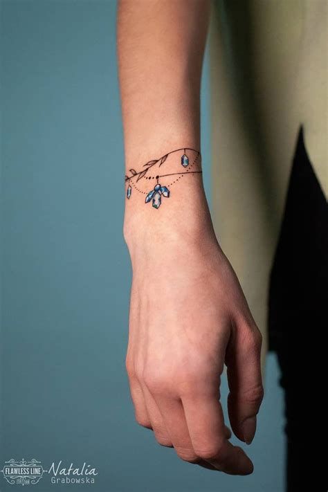 Friendship Bracelet Tattoo Designs. There are any references about Friendship Bracelet Tattoo Designs in here. you can look below. I hope this article about Friendship Bracelet Tattoo Designs can be useful for you. Please remember that this article is for reference purposes only. #friendship #bracelet #tattoo #designs Wrist Tattoos Bracelet, Tattoos Bracelet, Charm Bracelet Tattoo, Bracelet Tattoos, Wrist Bracelet Tattoo, Tattoos For Moms With Kids, Cuff Tattoo, Tattoos For Moms, Biker Women