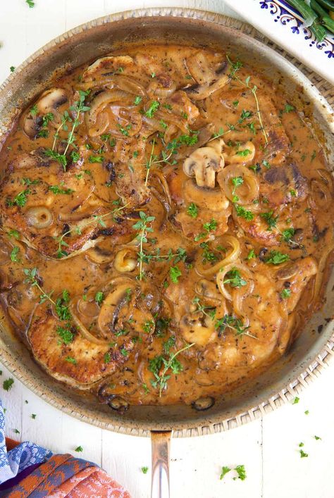 Smothered Pork Chops with Onions and Mushrooms - The Suburban Soapbox Smothered Pork Chops With Onions, Easy Smothered Pork Chops, Pork Chops With Mushrooms, Smothered Potatoes, Perfect Pork Chops, Best Pork Chop Recipe, Smothered Pork Chops Recipe, Pan Seared Pork Chops, Center Cut Pork Chops