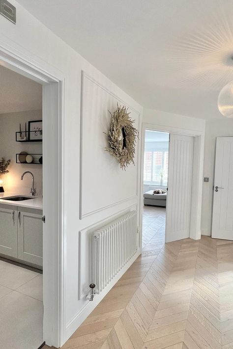 Cosy white Windsor columns in a beautiful minimal hallway over at @l.h_home. Shop the timeless rad. Hallway Radiator Ideas, Hallway Radiators, Cosy Hallway, Hallway Radiator, Minimal Hallway, Radiator Ideas, Victorian Hall, Decorative Radiators, Landing Ideas