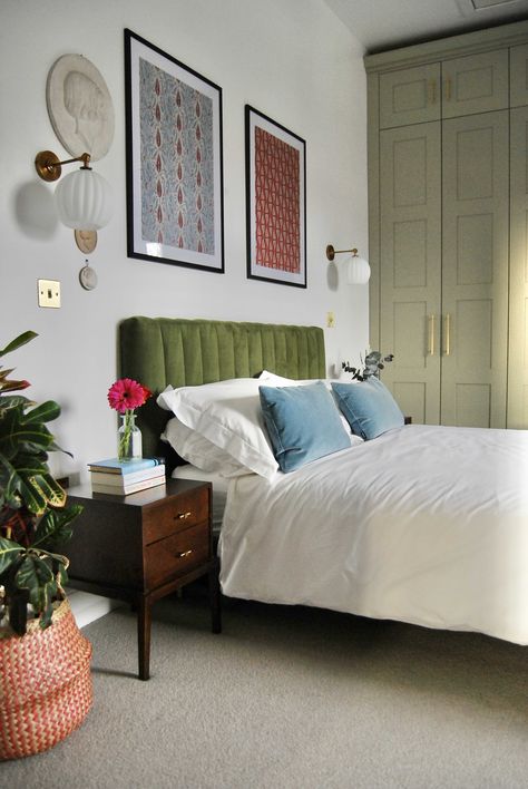 Tour a Remodeled Period Property Not Touched for Decades | Apartment Therapy Bedroom With Green Headboard, Modern Eclectic Interior Design Bedroom, Where To Put A Bed In A Bedroom, Art Over Dresser, Blank Wall Bedroom Ideas, Velvet Green Bed, Green Bed Decor, Velvet Bed Bedroom Ideas, Green Bed Bedroom