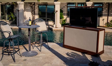 Cabinet Tronix Sunbrella outdoor weather proof lift cabinet hides & protects TV while increasing areas to watch TV. With this furniture having a 360 swivel & casters, spend more time outside by the pool, spa, deck, patio and sitting areas. https://www.cabinet-tronix.com/tv-lift-cabinets/sunbrella-outdoor-tv-lift-cabinet/  Great Falls Virginia Outdoor Tv Lift Cabinet, Outdoor Tv Ideas, Outdoor Tv Stand, Patio Tv, Tv Stand Plans, Outdoor Tv Cabinet, Outdoor Fire Pit Area, Tv Lift Cabinet, Tv Ideas