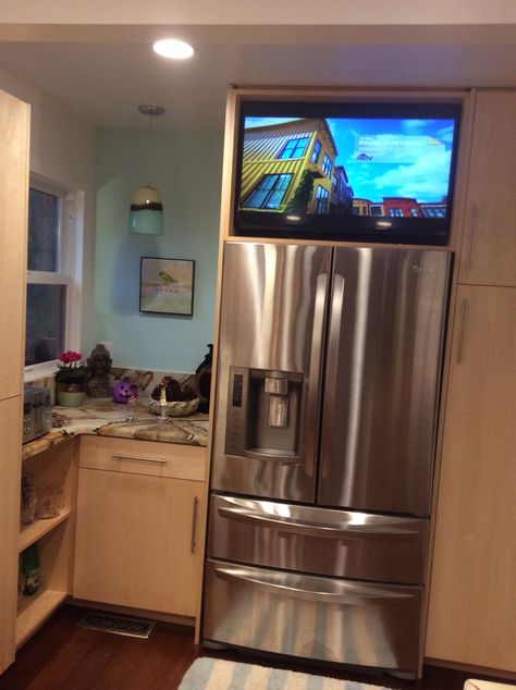 Kitchen TV Tv Above Fridge Kitchens, Tv Above Refrigerator, Kitchen With Tv Ideas, Kitchen Tv Wall Ideas, Tv In Kitchen Ideas, Kitchen Tv Ideas, Kitchen With Tv, Hidden Television, Tv Kitchen