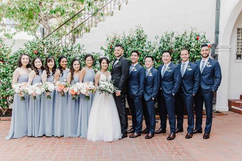 Cassandra & Quang's Romantic Wedding at the Darlington House in La Jolla, CA Blue Bridesmaid Dresses With Groomsmen In Black, Slate Blue Bridesmaid Dresses Navy Suits, Blue And Black Groomsmen, Bridal Party Groomsmen Color Schemes, Black And Dusty Blue Wedding, Slate Blue Wedding Party, Blue Bridesmaid Dresses With Groomsmen, Dusty Blue Bridal Party, Blue Entourage