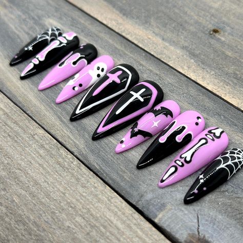 Pink and Black Halloween Press On Nails | Hand-Drawn Coffins, Crosses, Ghosts, Slime Drip, Bones, Bats, and Spiderwebs Goth Nails Halloween, Goth Pastel Nails, Pastel Goth Nails Short, Hot Pink And Black Halloween Nails, Planchette Nails, Pastel Witch Nails, Girly Goth Nails, Pink Black Halloween Nails, Black Nails With Pink Design