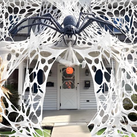 PRICES MAY VARY. Giant spider web: The size of the stretchy spider webbing cloth measure about 4.6x23 feet(820sqft), able to cover a large area. Suitable for organizing parties and decorating your home while Halloween, please note that spiders are not included. Premium stretchy: The spider web is flexible and stretchable, convenient for you to cut freely, adjust the size and shape according to the actual needs, creating unique decorative effects. Easy to install and DIY: Spider webs are easy to Bug Halloween Decorations, Halloween Web Decorations, Spider Web Outdoor Decor, Spider Themed Halloween Decor Outside, Big Spider Halloween Decoration, Cheap Outdoor Halloween Decor, Haunted House Backdrop, Outdoor Spider Web Halloween, Spider Theme Halloween Decorations