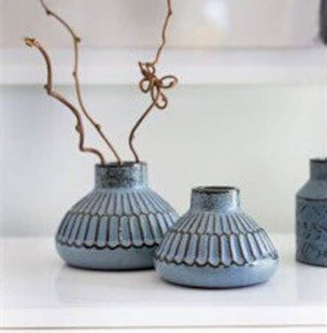 "These chic blue ceramic bud vases are made in the mold with dark clay, then glazed twice for a stunning yet understated two-tone design.  Perfect for vintage or modern decor. Two Sizes Small: 4.75\" x 3.5\" High Large: 5.75\" x 4.25\" High Hand wash only." Pottery Bud Vase Ideas, Pottery Bud Vase, Pottery Glaze Ideas, Pottery 101, Carving Pottery, Ceramic Bud Vases, Office Decor Vintage, Carved Pottery, Mini Vases