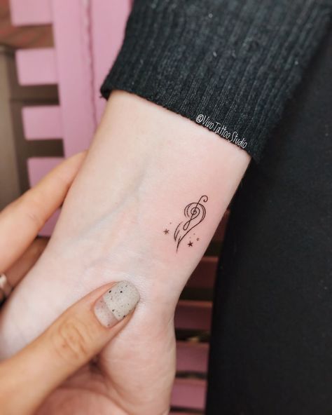 Flower Heartbeat Tattoo, Tiny Music Tattoo, Tattoos About Music, Music Tattoo Ideas, Small Music Tattoos, Word Tattoo Ideas, Hand Tattoo Designs, Tiny Wrist Tattoos, Word Tattoo