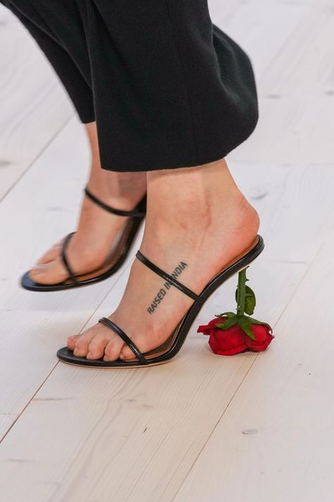 Dua Lipa Wears Viral Loewe Rose Heels With a Black Dress | POPSUGAR Fashion Loewe Rose Heels, Loewe Heels, Silk Wedding Dress Simple, Rose Heels, Rose Sandals, Tiny Purse, Chic Black Dress, White Lace Shirt, Flower Heels