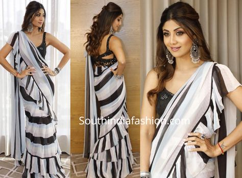 Shilpa Shetty attended an event in Melbourne wearing a black and white striped ruffle saree paired with black blouse by Arpita Mehta. Silver jewelry from Curio Cottage and Amrapali Jewels and a half-up half-down wavy hair rounded out her look! Hairstyle For Ruffle Saree, Western Saree Hairstyle, Black Ruffle Saree, Farewell Dress, Black And White Saree, Arpita Mehta, Amrapali Jewels, Kalamkari Dresses, Saree Hairstyles