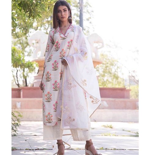 Image may contain: 1 person, standing Trendy Outfits Indian, White Kurta, Silk Bottoms, Silk Kurta, Hijabi Outfits Casual, Simple Pakistani Dresses, Person Standing, Indian Designer Wear, Kurta Set