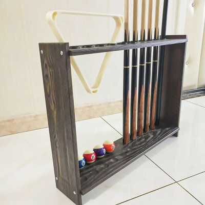 This product is a wooden 12-hole billiard cue rack, floor standing billiard cue storage rack, made of high quality MDF billiard cue rack with triangle billiard rack, more safe and durable. Billiard cue rack can be used to place fishing rods golf club cues. | Fargor 12-cue Pool Cue Rack Wood in Brown, Size 15.75 W in | Wayfair Cue Stick Holder, Pool Stick Holder, Pool Cue Rack, Pool Sticks, Field Hockey Sticks, Cue Rack, Indoor Bar, Billiard Accessories, Pool Ball