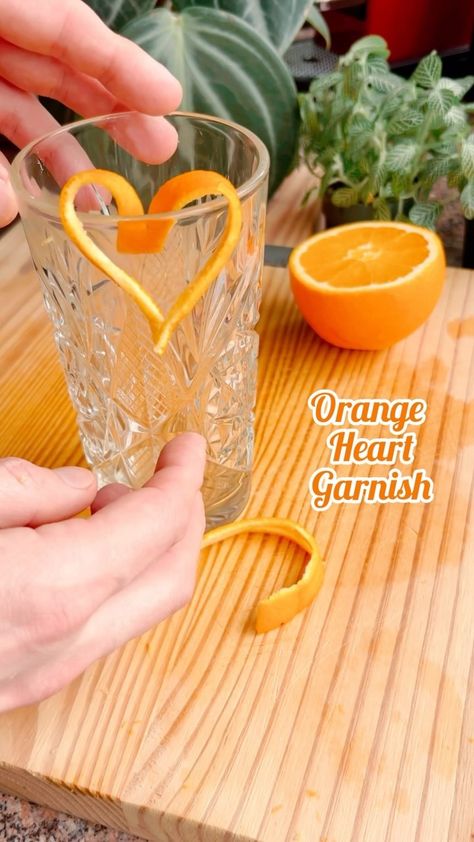 Björn van Tricht | How to make an easy heart shaped orange garnish? Check it out 🧡🍊 . . . #garnishgame #fruitcarving #cocktailart #mocktail #garnishing… | Instagram Orange Twist Garnish, Dehydrated Fruit Cocktail Garnish, Orange Garnish Cocktail, Drink Garnish Ideas, Orange Garnish, Drink Garnish, Bartending School, Cream Photography, Citrus Garnish