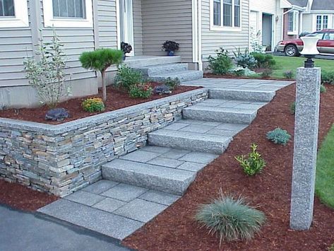 Upgrading your home's front entryway with granite steps minimizes maintenance, revamps for safety and aesthetics, and gives an overall boost to your home's curb appeal. Sloped Sidewalk Landscaping, Walkway To Porch Ideas, Outdoor Front Steps Ideas, Steps Down To Front Door, Walkway Steps Landscaping, Sloped Walkway To Front Door, Front Yard Stairs Entrance, Front Steps Landscaping, Front Yard Steps