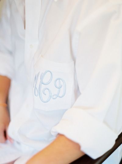 Monogrammed button down: http://www.stylemepretty.com/little-black-book-blog/2015/07/16/elegant-orange-navy-carlouel-yacht-club-wedding/ | Photography: Jacqui Cole - http://jacquicole.com/