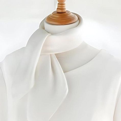 This 100% pure silk plain white scarf is the epitome of timeless elegance. Crafted from the finest quality silk, the scarf offers a luxurious, smooth texture that feels incredibly soft against the skin. The hand-rolled edges showcase meticulous craftsmanship, adding a touch of sophistication to this classic accessory. Its long, flowing design makes it versatile and perfect for various styling options--drape it gracefully around your neck, wear it as a chic headscarf, or tie it to your handbag fo White Classic Silk Scarf, Luxury White Traditional Silk Scarf, Chic White Satin Silk Scarf, Elegant White Handmade Silk Scarf, Luxury White Silk Scarves, White Silk Scarf, Luxury Silk Scarves, Silk Bandana, Silk Headscarf