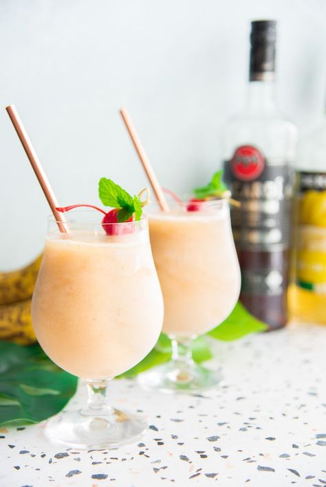 Frozen Banana Daiquiri Frozen Banana Daiquiri Recipe, Margaritaville Frozen Concoction Maker, Banana Daiquiri, Banana Liqueur, Mango Daiquiri, Daiquiri Recipe, Frozen Cocktail Recipes, Good Rum, Banana Drinks