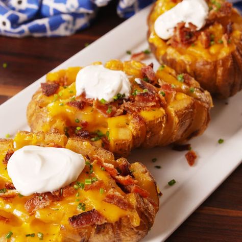 Bloomin' Baked Potatoes Are Everything Bloomin' Onions Could Never Be Blooming Potato Recipe, Blooming Potato, Breakfast Baked Potatoes, Perfect Baked Sweet Potato, Baked Potato Toppings, Cheesy Potatoes Recipe, Best Baked Potato, Perfect Baked Potato, Thanksgiving Side Dishes Easy