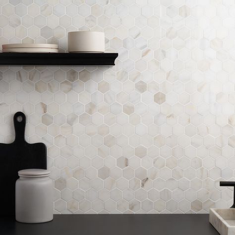 Shop White Jade 2" Hexagon Polished Marble Mosaic. About The Tile: Tradition with a twist, the White Jade 2" Hexagon Polished Marble tile is a beautiful marble piece that offers a modern, small-scale geometric pattern. With a polished creamy white body and beige veining throughout, it adds a touch of luxury to any design.Perfect for backsplashes, floors, or accent walls. Key Features High-end Authentic Marble Tile. Modern Small-Scale 2” Hexagon Format. Elegant White Body with Beige Veining. Styl Hexagon Backsplash Kitchen, White Hexagon Backsplash, Hexagon Tile Backsplash Kitchen, Hexagon Tile Kitchen, Penny Tile Backsplash, Marble Mosaic Backsplash, Hexagon Tile Backsplash, Luxurious Kitchen Design, White Mosaic Tile