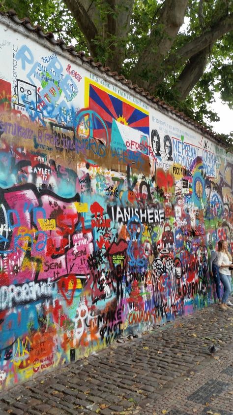 The john Lennon wall prague John Lennon Wall Prague, Jhon Lennon, Lennon Wall, John Lennon Wall, Ariel Disney, Disney Ariel, Lost Soul, Vacation Travel, John Lennon