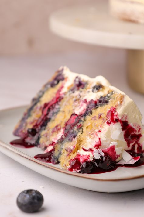 Blueberry Coconut Cake Coconut Blueberry Cake, Blueberry Coconut Cake, Coconut Sponge Cake Recipe, Coconut Roll Cake, Coconut Sponge Cake, Coconut Blueberry, Coconut Roll, Coconut Buttercream, Coconut Cake Recipe