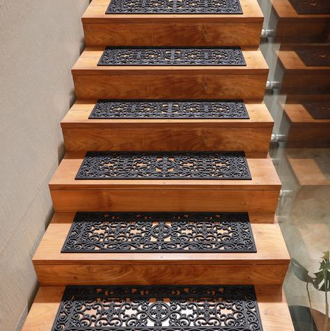 PRICES MAY VARY. STAIR TREAD SET CONTAINS: Six (6) IRONGATE Welcome Staircase Mats in Black, each measuring 10" x 30" to fit easily on any step. DECORATIVE, FUNCTIONAL, HIGH-QUALITY CONSTRUCTION: This durable stair mat is made from solid rubber to stand up to heavy use and create a safer, non-slip surface where you need one. The scrollwork design takes inspiration from iron grillwork to instantly add a classic aesthetic to any boring stair well. Heavy duty, pet friendly and sturdy construction w Steps For Front Of House, Inside Steps Ideas, Entryway Stairs Ideas, Nonslip Stair Ideas, Stairs With Tile Risers, Stairs Flooring Ideas, Vintage Staircase, Staircase Paneling, Pool Balcony