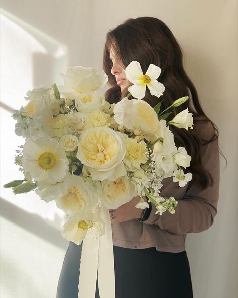 These flowers, like the song, evoke a sense of raw beauty and vulnerability, reminding me to embrace the delicate moments in life. #ButteryYellowVibes #SoulfulSerendipity #yellowwedding #bridalbouquet #summerbouquet #summerwedding #springwedding #bridalbouquet #flowers #butteryyellow #yellowbouquet #lexieetheflowergirl #gaweddings #alweddings #georgiaweddings #alabamaweddings #weddingflorist Butter Yellow Flowers, Pale Yellow And White Wedding Flowers, European Bridal Bouquet, Pale Yellow Wedding Flowers, White And Yellow Wedding Flowers, Yellow Wedding Florals, Butter Yellow Wedding, White And Yellow Bouquet, Pale Yellow Wedding