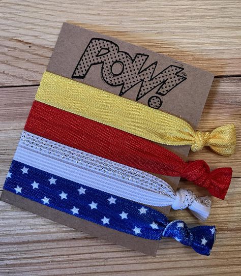 Wonder Woman hair ties WW hair ties Wonder Woman hair ties Wonder Woman Party Favors, Wonder Woman Decorations, Toddler Birthday Themes, Supergirl Birthday, Wonder Woman Cake, Superhero Party Favors, Wonder Woman Birthday Party, Geek Party, Girl Superhero Party