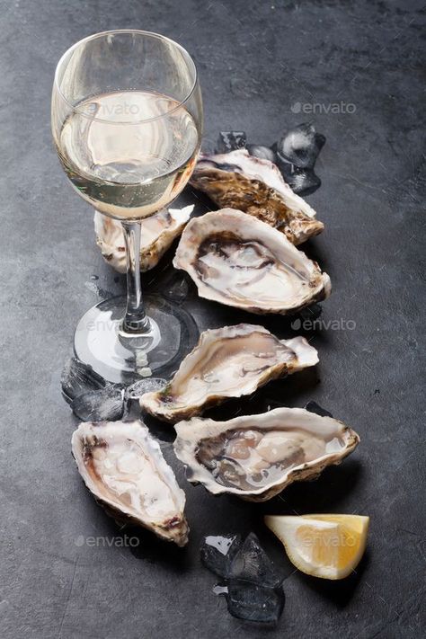 Raw Restaurant, Seafood Tower, Fruity Cake, Oyster Recipes, Wine Photography, Raw Bars, Stone Table, Oyster Plates, Food Photography Tips