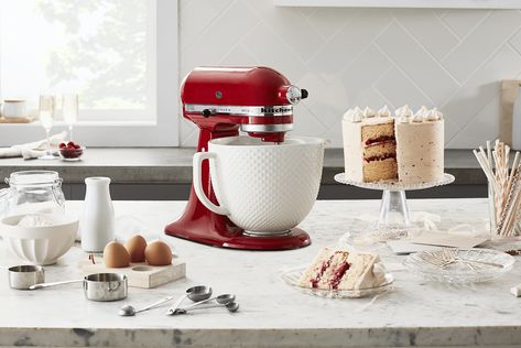 Red KitchenAid® Stand Mixer on a counter next to a three layer white frosted cake, milk, eggs, measuring cups and flour Easy Buttercream Frosting, Strawberry Buttercream Frosting, Stand Mixers, Kitchenaid Mixer, Caramel Frosting, Kitchenaid Stand Mixer, Chocolate Buttercream Frosting, Vanilla Buttercream Frosting, Buttercream Frosting Recipe