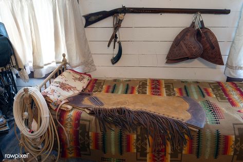 Some of the genuine Old West possessions displayed inside a bunkhouse — a small railroad office moved to the location and converted for ranch use — on a ranch owned by Annie Young Shelton and Ferol Shelton near Clarendon in the Texas Panhandle. Original image from Carol M. Highsmith’s America, Library of Congress collection. Digitally enhanced by rawpixel. | free image by rawpixel.com / Carol M Highsmith Cowboy Blanket, Blanket Western, Austin Neighborhoods, Uss Texas, Texas Panhandle, Old Western, Office Moving, Old Beds, Guest Ranch