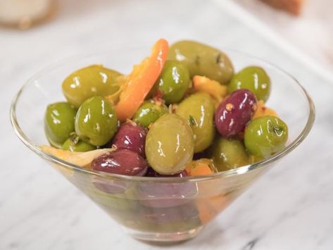 Get Warm Citrus-Marinated Olives Recipe from Food Network Quick Appetizers For A Party, Appetizers For A Party, Olive Recipes Appetizers, Olive Appetizer, Giada Recipes, Marinated Olives, Olive Recipes, Lemon Thyme, Olive Relish