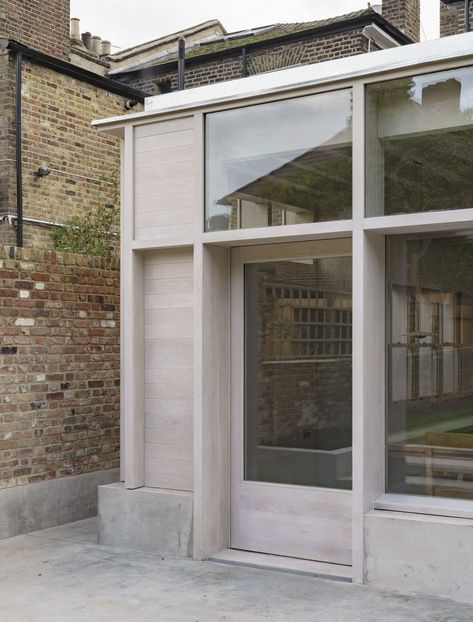 Tasked with crafting versatile spaces suitable for relaxation, entertaining, and hosting intimate dining and arts evenings, DGN Studio have transformed a dark Victorian semi-detached terrace into a serene, brutalist-inspired home in East London. Concrete Retaining Walls, Concrete Column, Timber Ceiling, Concrete Bench, Terrazzo Tiles, Chimney Breast, Rear Extension, Concrete Forms, Street House