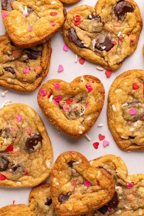 These easy Heart Shaped Chocolate Chip Cookies have 10 minute prep time. Just add red and pink sprinkles for a fun Valentine’s Day Cookie! Heart Shaped Chocolate Chip Cookies, Shaped Chocolate Chip Cookies, Valentines Aesthetic, Confetti Cookies, Drop Cookie Recipes, Pink Sprinkles, Heart Shaped Chocolate, Heart Sprinkles, Heart Shaped Cookies