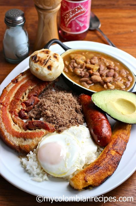 Dive into the vibrant flavors of Colombia with this Paisa Feast Platter, a culinary journey that brings the heart of Medellin to your table. This platter is a celebration of rich traditions, featuring an array of mouthwatering dishes like bandeja paisa, chicharrón, and arepas, each crafted to perfection. Perfect for sharing with friends and family, this feast is a delightful mix of textures and tastes, offering a true taste of Colombian culture. Whether you're hosting a dinner party or simply exploring new cuisines, this platter promises an unforgettable dining experience. Garlic Parmesan Pasta, Colombian Culture, Colombian Food, Parmesan Pasta, Spinach Stuffed Mushrooms, Garlic Parmesan, Grocery List, Food Waste, Dining Experience