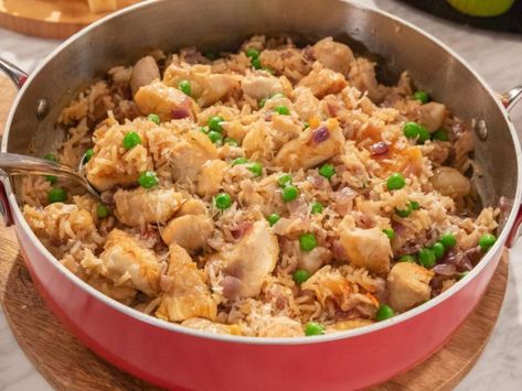 Raffy’s Chicken and Rice | Giadzy Giada Recipes, Chicken And Rice Recipe, Nut Free Recipes, Giada De Laurentiis, Chicken And Rice, Delicious Chicken, Chicken Rice, Frozen Peas, Rice Recipe