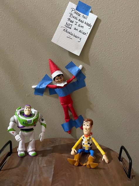 Elf on the Shelf ideas Elf On The Shelf Buzz Lightyear, Elf On The Shelf With Woody And Buzz, Disney Themed Elf On The Shelf, 2022 Elf On The Shelf Ideas, Elve On A Shelf Ideas, Elf Shelf, Woody And Buzz, Elf On The Shelf Ideas, Shelf Ideas