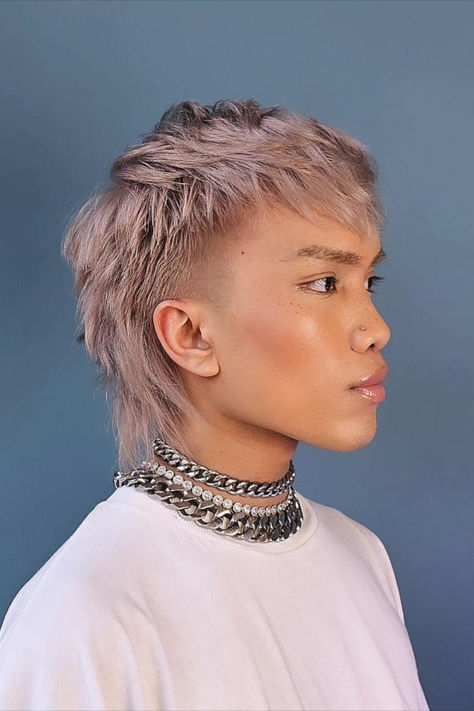 An edgy lavender mullet with textured layers on a non-binary individual, showcasing a stylish hairstyle for 2024. Soft Mullet Hairstyle Women Short, Lavender Mullet, Non Binary Mullet, How To Cut A Mullet, Short Bangs Mullet, Mullet Outfit, Mullet Hawk, Faux Hawk Mullet, Nonbinary Mullet