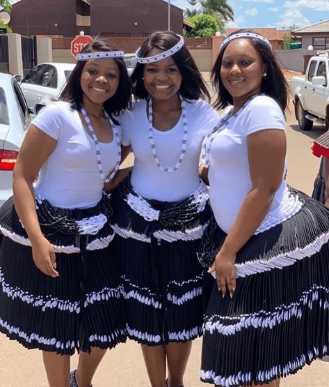 Beautiful Bridesmaids In Black and White Tsonga Xibelani Skirts and Beaded Accessories Tsonga Traditional Attire, Tsonga Traditional Dresses, Bridesmaids In Black, Pedi Traditional Attire, South African Clothes, Wedding Seasons, South African Traditional Dresses, African Traditional Wear, Cultural Fashion