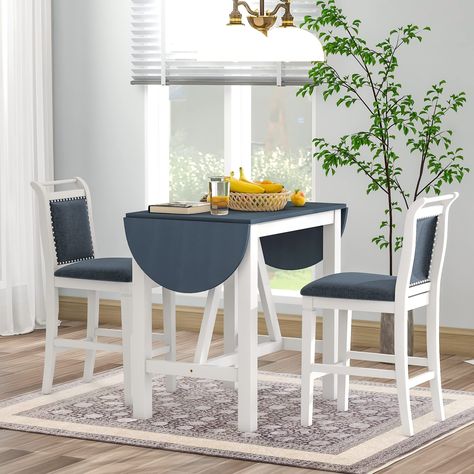 PRICES MAY VARY. 【Half-Round Drop Leaf Sides】- Offer 2 great dining chairs and an attractive kitchen table,this refined dinette set will reinvent your dining room with its extendable drop leaf design. Featured with two foldable half-round sides, this table provides you with the flexibility of creating more living space or eating space as needed. 【Heavy Solid Wood Frame】- Built with solid rubber wood frame, this kitchen set is designed to last for years. The triangular supportive bars and stretch Counter Height Dining Table Set, Leaf Dining Table, Folding Dining Table, Drop Leaf Dining Table, Counter Height Dining Table, Bullet Points, Kitchen Table Settings, Wood Counter, Dining Room Small