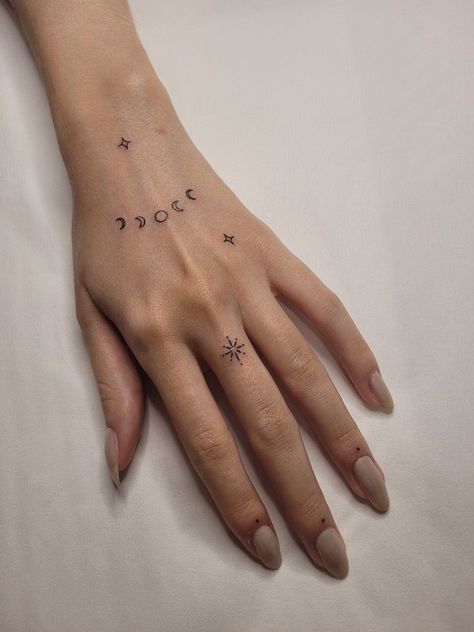 #tattoo, #tattoos, #inked, #tattooart, #tattooedwomen, #tattooedguys, #tattooinspiration, #tattooideas, #tattooworldwide, #tattoosociety, #InkLaughs, and #TattooFails​ Moon Finger Tattoo Designs, Celestial Finger Tattoos For Women, Minimalist Hand Tattoos For Women, Ataraxia Tattoo, Hand Tattoo Minimalist, Left Hand Tattoo, Small Finger Tattoos, Tato Jari, Hand And Finger Tattoos