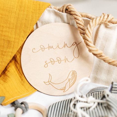 A delightful wooden new baby Keepsake Sign, perfect for a nautical baby shower celebration! If you're celebrating an impending new arrival (congratulations - eek!) these birth announcement signs help you to share your good news with the world. Whether it's via Instagram or Facebook, use your new baby sign as a unique photo prop. The ideal newborn gift or baby shower gift, each new baby keepsake token is intricately engraved with the wording 'coming soon' above a handdrawn whale motif. Created by Baby Birth Announcement Sign, Instagram Photo Prop, Baby Birth Announcement Photos, Custom Wedding Hangers, Logo Online Shop, Birth Announcement Photos, Sew Dress, Announcement Photos, Birth Announcement Sign